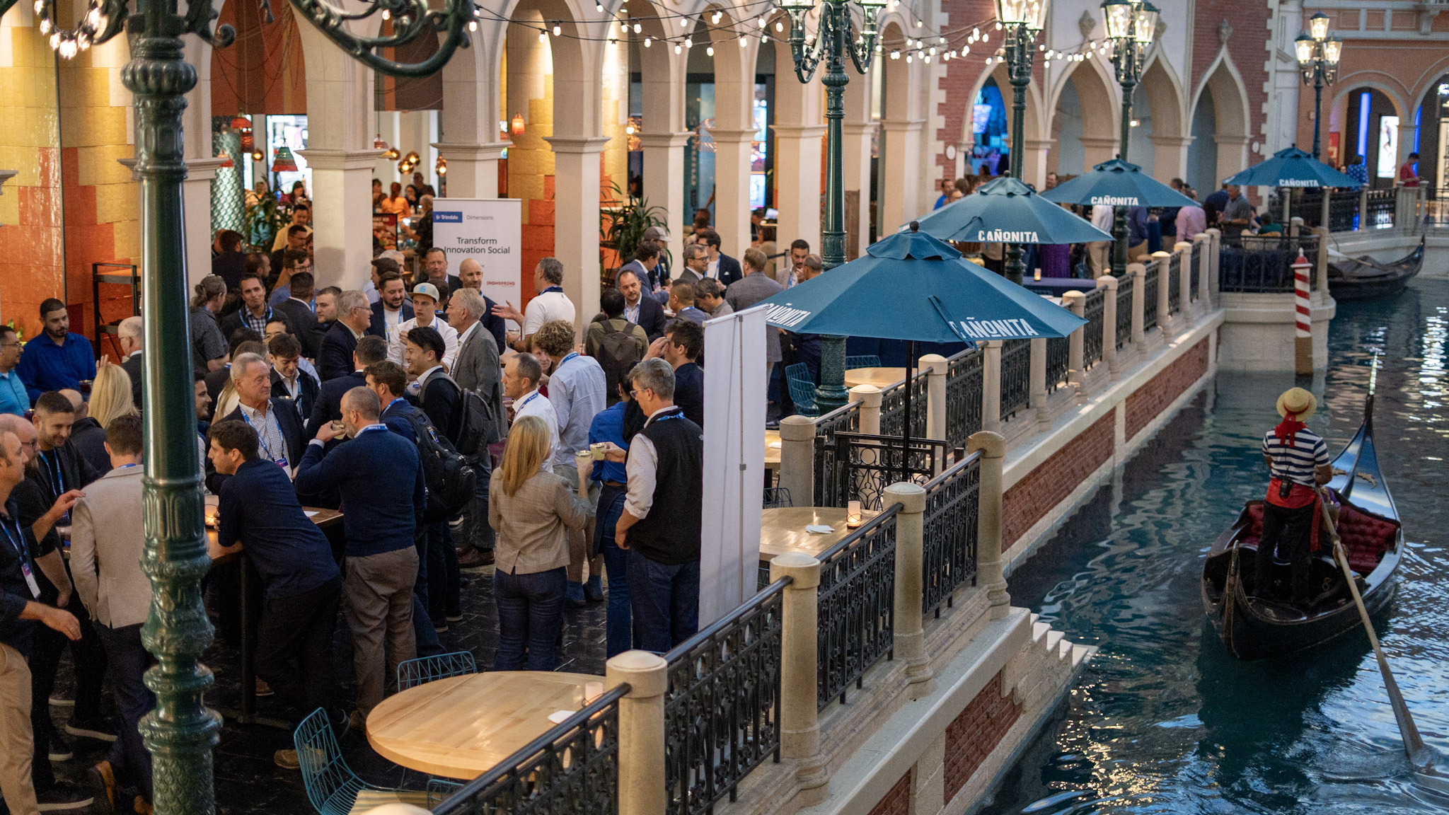 View from above the Transform Innovation Social at Canonita in The Venetian. Trimble Dimensions attendees are networking.