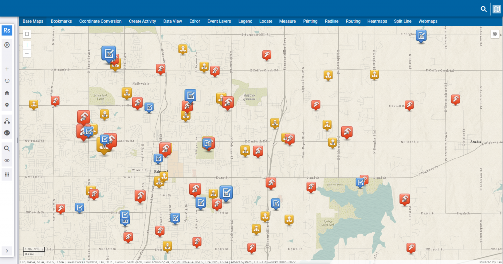 Map display with various location markers including red fire icons, yellow caution icons, and blue checkmark icons.